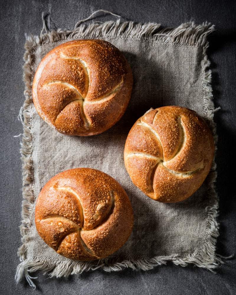 homemade-golden-rolls-on-rustic-linen-napkin-2023-11-27-05-37-06-utc (1)
